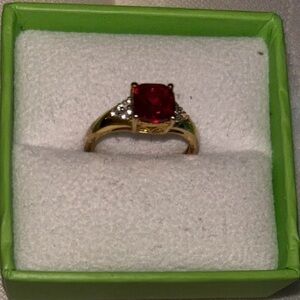 Elegant Gold and Red Gemstone Ring
